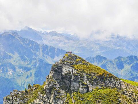 Group of hikers on the summit