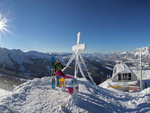 Summit cross on the Hauser Kaibling in winter